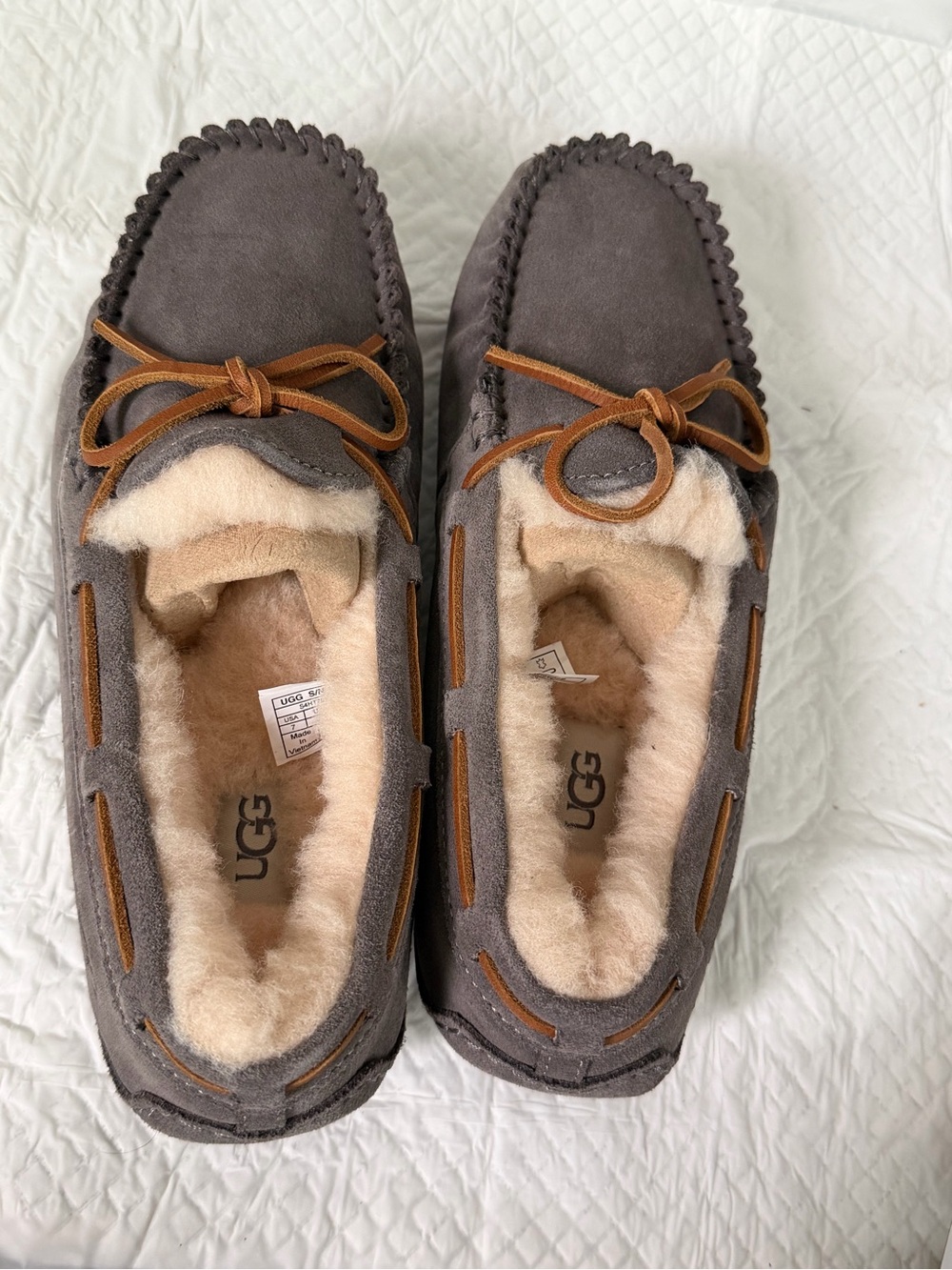 UGG women’s  Grey Suede Shearling Lined Moccasin Slippers with Brown Trim